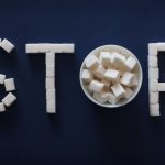 Preventing Obesity - the word stop spelled out of marshmallows in a bowl