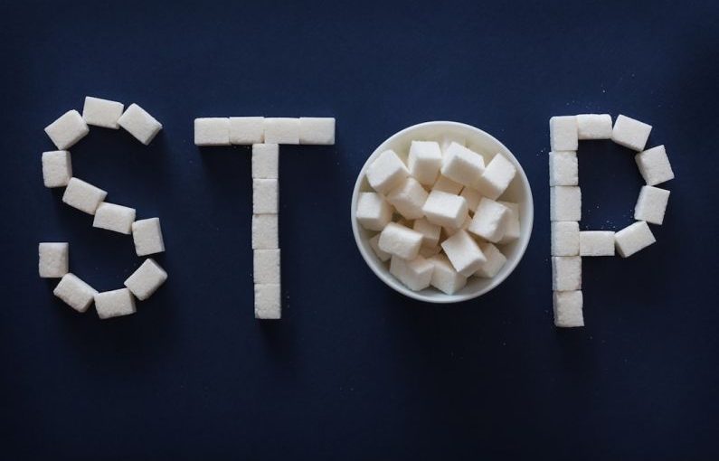 Preventing Obesity - the word stop spelled out of marshmallows in a bowl