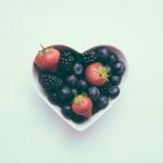 Pregnant Nutrition - heart-shaped bowl with strawberries