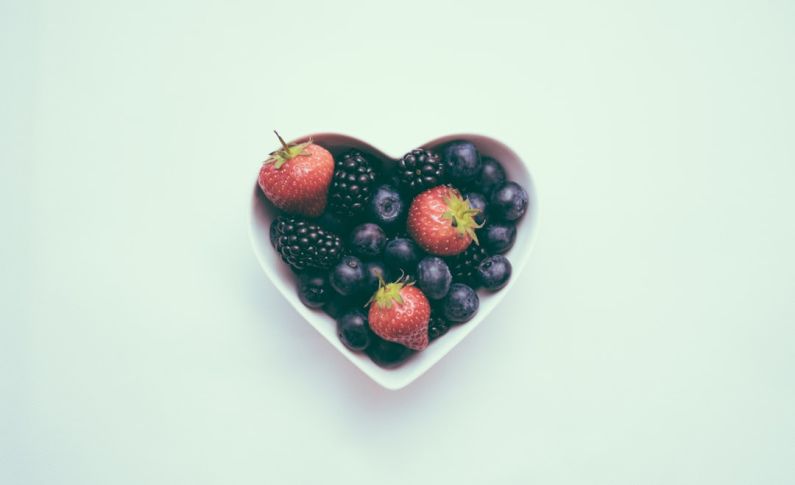 Pregnant Nutrition - heart-shaped bowl with strawberries