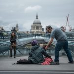 Lifestyle Feeding - person sitting on floor near people