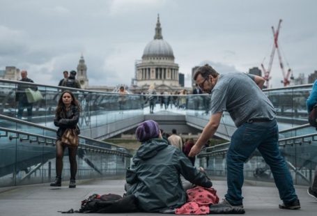 Lifestyle Feeding - person sitting on floor near people