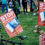 Pet Weight - a group of red and white signs on a bike